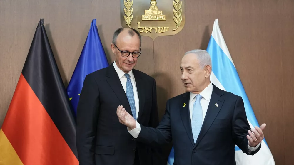 12 July 2025, ---, Jerusalem: German Chancellor Friedrich Merz (L) stands next to Benjamin Netanyahu, Prime Minister of Israel, before talks at the seat of government. Merz's inaugural visit to Israel will focus on stabilizing the ceasefire in Gaza, the ongoing peace process and German-Israeli relations. Photo: Michael Kappeler/dpa