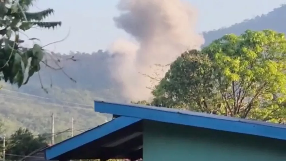 Smoke rises from the site, after Thailand launched air strikes along its disputed border with Cambodia, according to Thai army, in Choeteal Kong, Preah Vihear Province, Cambodia, in this screengrab obtained from social media video released on December 8, 2025. Social media via REUTERS THIS IMAGE HAS BEEN SUPPLIED BY A THIRD PARTY. NEWS USE ONLY. NO RESALES. NO ARCHIVES. VERIFICATION - Reuters was able to confirm the location from the terrain matching topography imagery of the area. Shape of smoke plume seen in the video also matched corroborating footage. - Reuters was not able to independently verify the date of the video. - Cambodia's defence ministry said that the Thai military had launched attacks on its forces at two locations on Monday (December 8).