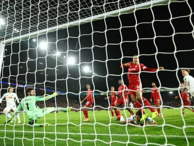 Soccer Football - Premier League - Leeds United v Liverpool - Elland Road, Leeds, Britain - December 6, 2025 Leeds United's Ao Tanaka scores their third goal Action Images via Reuters/Andrew Boyers EDITORIAL USE ONLY. NO USE WITH UNAUTHORIZED AUDIO, VIDEO, DATA, FIXTURE LISTS, CLUB/LEAGUE LOGOS OR 'LIVE' SERVICES. ONLINE IN-MATCH USE LIMITED TO 120 IMAGES, NO VIDEO EMULATION. NO USE IN BETTING, GAMES OR SINGLE CLUB/LEAGUE/PLAYER PUBLICATIONS. PLEASE CONTACT YOUR ACCOUNT REPRESENTATIVE FOR FURTHER DETAILS..