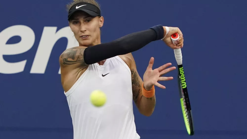 ﻿Polona Hercog, of Slovenia, strikes the ball during the first round of the US Open tennis championships, Tuesday, Aug. 31, 2021, in New York. (AP Photo/Elise Amendola)