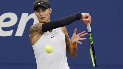 Polona Hercog, of Slovenia, strikes the ball during the first round of the US Open tennis championships, Tuesday, Aug. 31, 2021, in New York. (AP Photo/Elise Amendola)