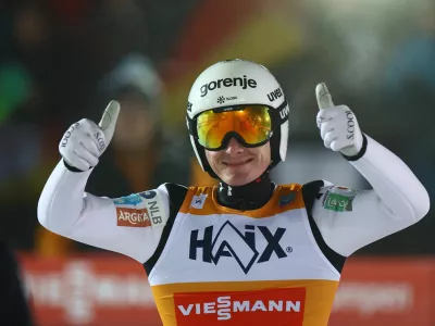 Ski Jumping - FIS Ski Jumping World Cup - Klingenthal, Germany - December 14, 2025 Slovenia's Domen Prevc celebrates after winning the Men's Individual HS140 REUTERS/Lisi Niesner