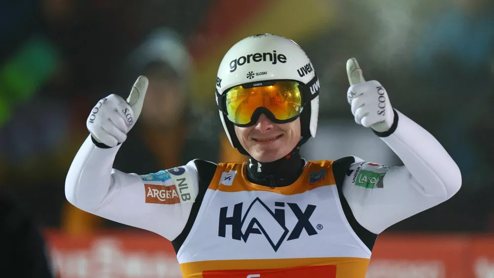 Ski Jumping - FIS Ski Jumping World Cup - Klingenthal, Germany - December 14, 2025 Slovenia's Domen Prevc celebrates after winning the Men's Individual HS140 REUTERS/Lisi Niesner