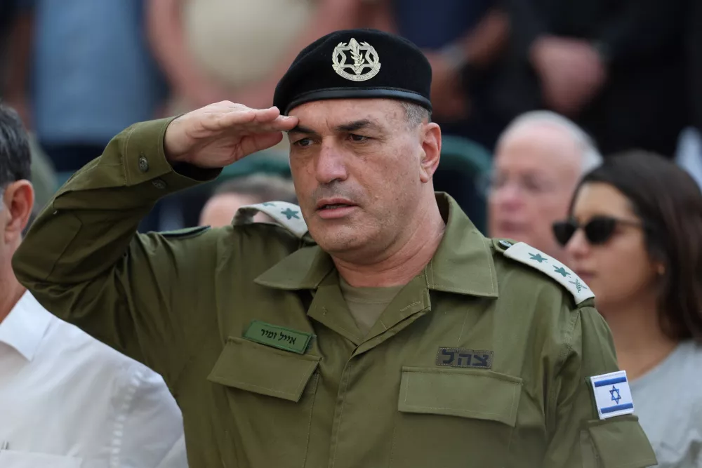IDF chief of staff Eyal Zamir salutes during the funeral of late Israeli hostage soldier Hadar Goldin in the military cemetery in Kfar Saba, Israel, 11 November 2025. Hadar Goldin was killed by Hamas on 01 August 2014. His body had remained in captivity ever since the 2014 Israel-Gaza war, or Operation Protective Edge. Hadar Goldin's body returns as part of the ceasefire deal between Israel and Hamas. Around 4 bodies of Israeli hostages still remain in Hamas captivity.  ABIR SULTAN/Pool via REUTERS