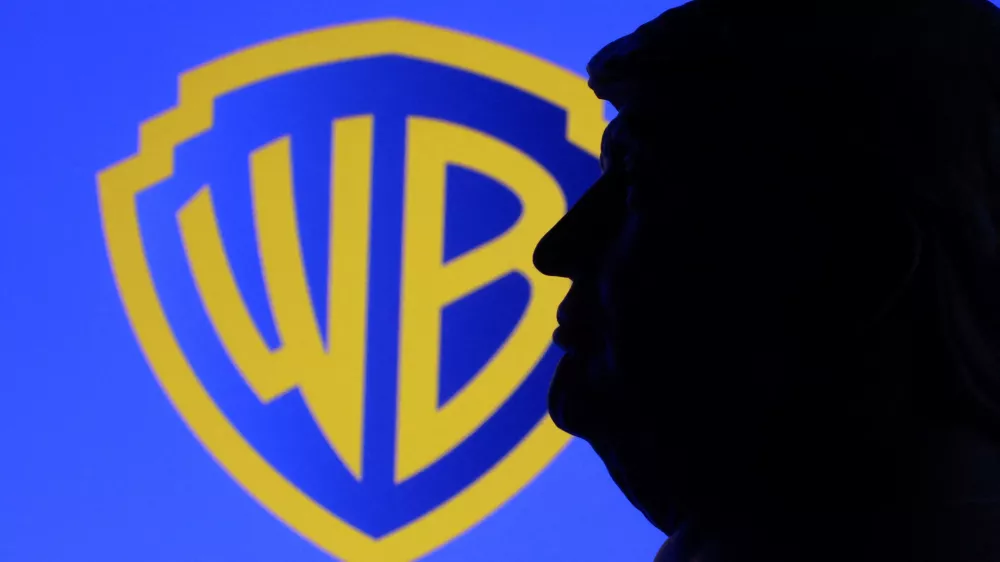 A 3D-printed miniature model depicting U.S. President Donald Trump appears in front of the Warner Bros logo in this illustration taken December 8, 2025. REUTERS/Dado Ruvic/Illustration