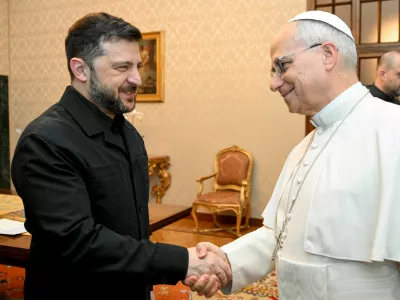 Pope Leo XIV and Ukraine's President Volodymyr Zelenskiy shake hands at Villa Barberini in Castel Gandolfo, Italy, December 9, 2025.  Vatican Media/­Simone Risoluti/Handout via REUTERS  ATTENTION EDITORS - THIS IMAGE WAS PROVIDED BY A THIRD PARTY.   TPX IMAGES OF THE DAY