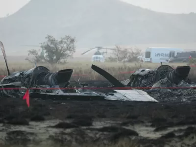 Wreckage lies at the site of the Turkish C-130 military cargo plane crash near the Azerbaijani border, in Sighnaghi municipality, Georgia, November 12, 2025. REUTERS/Irakli Gedenidze
