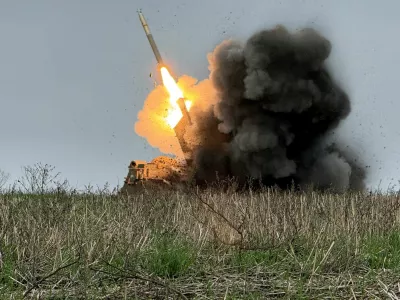 Ukrainian servicemen fire a Multiple Launch Rocket System (MLRS) towards Russian troops, amid Russia's attack on Ukraine, near the frontline town of Pokrovsk in Donetsk region, Ukraine December 9, 2025. REUTERS/Stringer