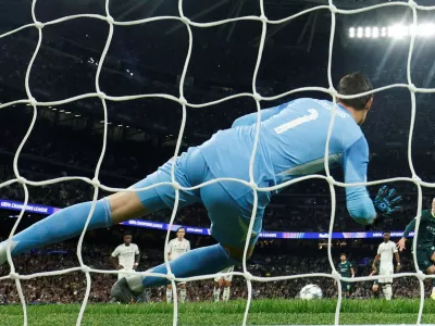 Soccer Football - UEFA Champions League - Real Madrid v Manchester City - Santiago Bernabeu, Madrid, Spain - December 10, 2025 Manchester City's Erling Haaland scores their second goal from the penalty spot REUTERS/Susana Vera   TPX IMAGES OF THE DAY