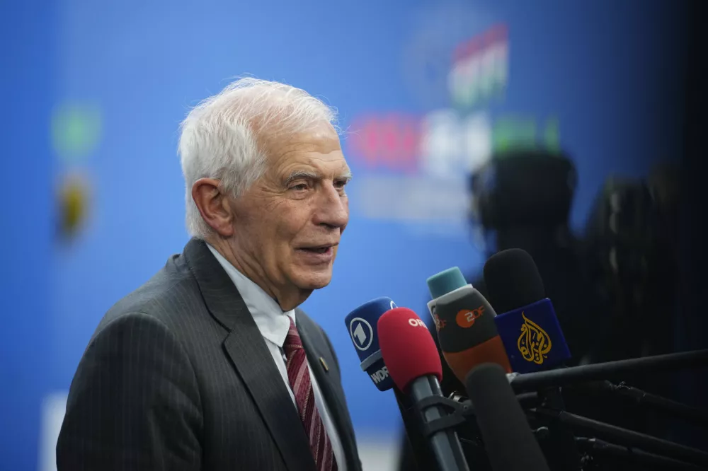 European Union foreign policy chief Josep Borrell speaks with the media as he arrives for an EU Summit at the Puskas Arena in Budapest, Hungary, Friday, Nov. 8, 2024. (AP Photo/Petr David Josek)