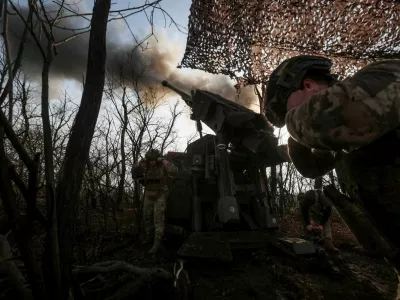 FILE PHOTO: Servicemen of the 148th Separate Artillery Zhytomyr Brigade of the Armed Forces of Ukraine fire a Caesar self-propelled howitzer towards Russian troops at a position on the front line, amid Russia's attack on Ukraine, near the frontline town of Pokrovsk in Donetsk region, Ukraine November 23, 2025. REUTERS/Anatolii Stepanov/File Photo