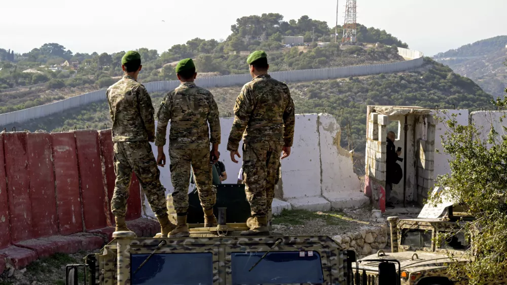 November 28, 2025, Wadi Zibqin, Wadi Zibqin, Lebanon: Lebanese soldiers look at an Israeli post opposite to their position the southern Lebanese border village in Alma al-Shaab during a media tour by the armed forces to review the operations in the southern Litani sector. The visit aimed to show the restoration of state control and disarming non-state actors in the region. This was described as a first-time event in the context of recent post-ceasefire operations. (Credit Image: © Marwan Naamani/ZUMA Press Wire)