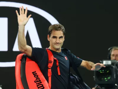 FILE PHOTO: Tennis - Australian Open - Semi Final - Melbourne Park, Melbourne, Australia - January 30, 2020. Switzerland's Roger Federer looks dejected after his match against Serbia's Novak Djokovic. REUTERS/Kai Pfaffenbach/File Photo