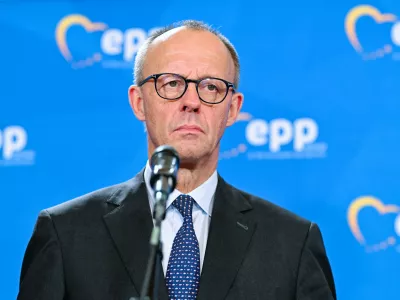 12 December 2025, Baden-Württemberg, Heidelberg: German Chancellor Friedrich Merz gives a press conference at the end of a meeting of the EPP Group in the European Parliament. Photo: Uwe Anspach/dpa