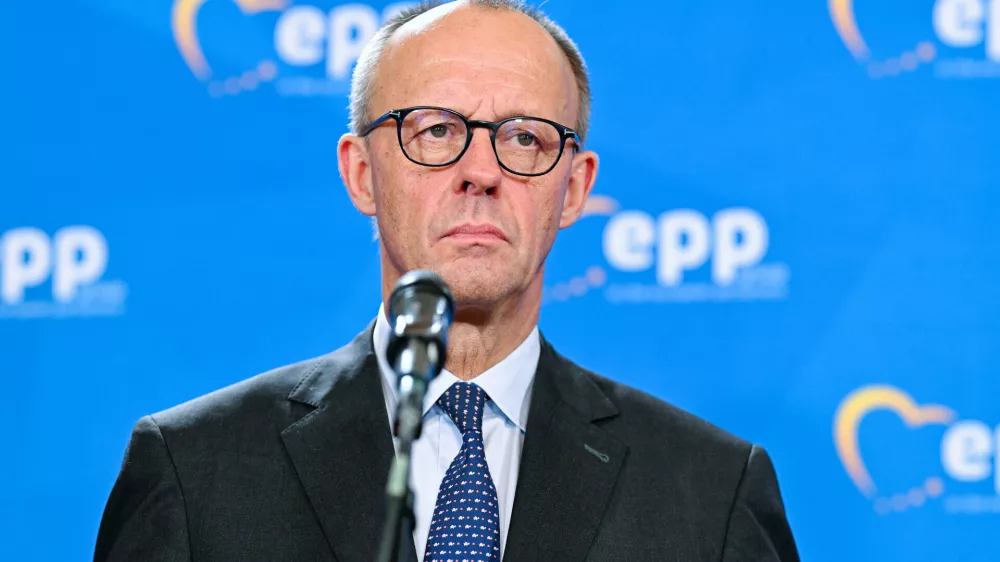 12 December 2025, Baden-Württemberg, Heidelberg: German Chancellor Friedrich Merz gives a press conference at the end of a meeting of the EPP Group in the European Parliament. Photo: Uwe Anspach/dpa