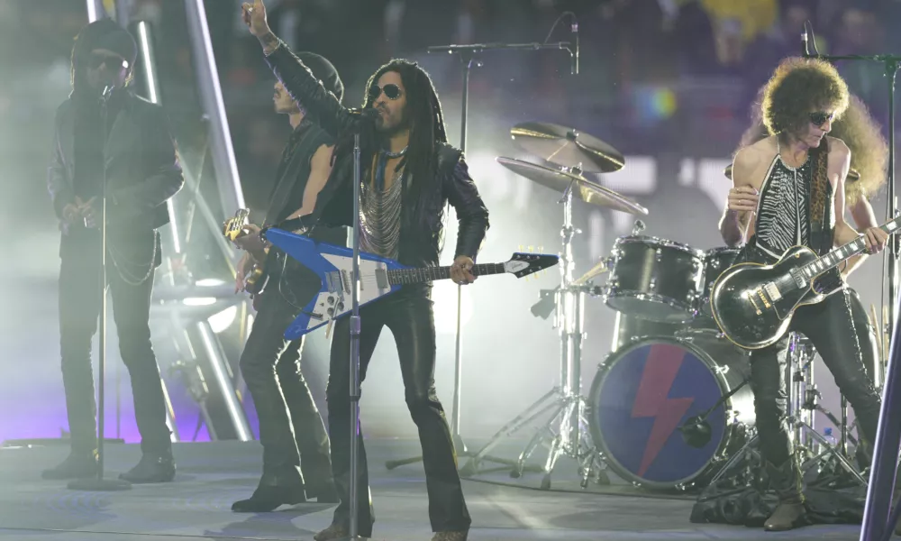 Lenny Kravitz performs before the Champions League final soccer match between Borussia Dortmund and Real Madrid at Wembley stadium in London, Saturday, June 1, 2024. (AP Photo/Dave Shopland)