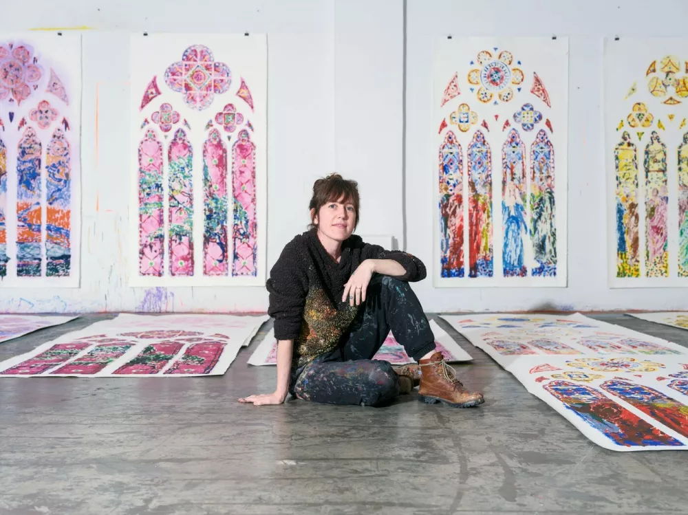 The artist Claire Tabouret in her Los Angeles studio on Jan. 16, 2025. Tabouret, a Frenchwoman living and working in Los Angeles, was chosen to create new stained glass windows for the Notre-Dame Cathedral in Paris. She never expected fires to shatter her sense of safety in California.,Image: 959492232, License: Rights-managed, Restrictions:, Model Release: no