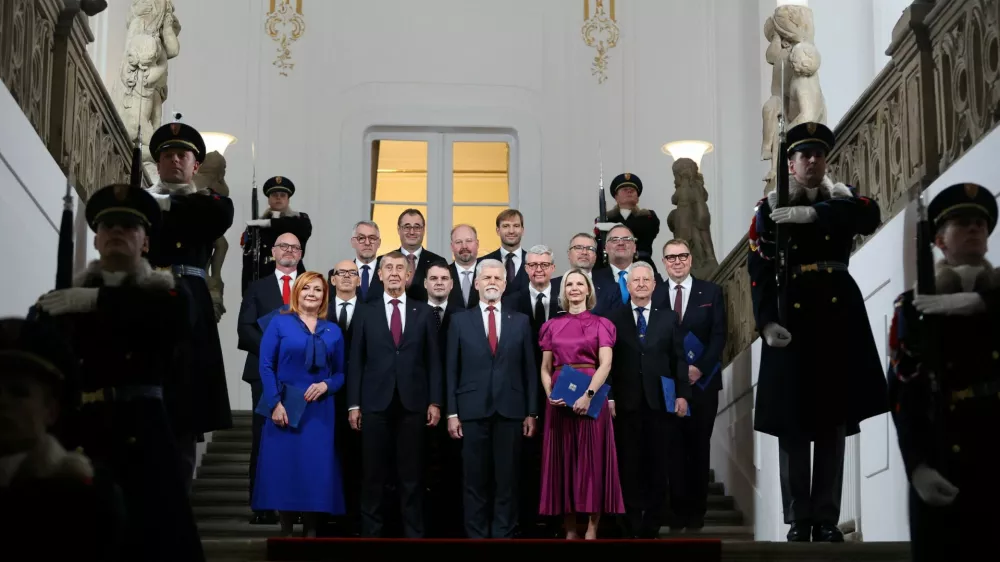 Czech President Petr Pavel and Prime Minister Andrej Babis pose for a group photo with newly appointed members of the Czech government after the cabinet's inauguration at Prague Castle in Prague, Czech Republic, December 15, 2025. REUTERS/Eva Korinkova