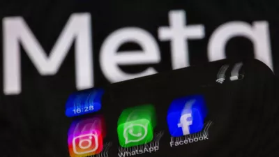 FILED - 16 May 2024, Mecklenburg-Western Pomerania, Schwerin: The apps Instagram, Facebook and WhatsApp can be seen on the display of a smartphone in front of the logo of the internet company Meta. Photo: Jens Büttner/dpa