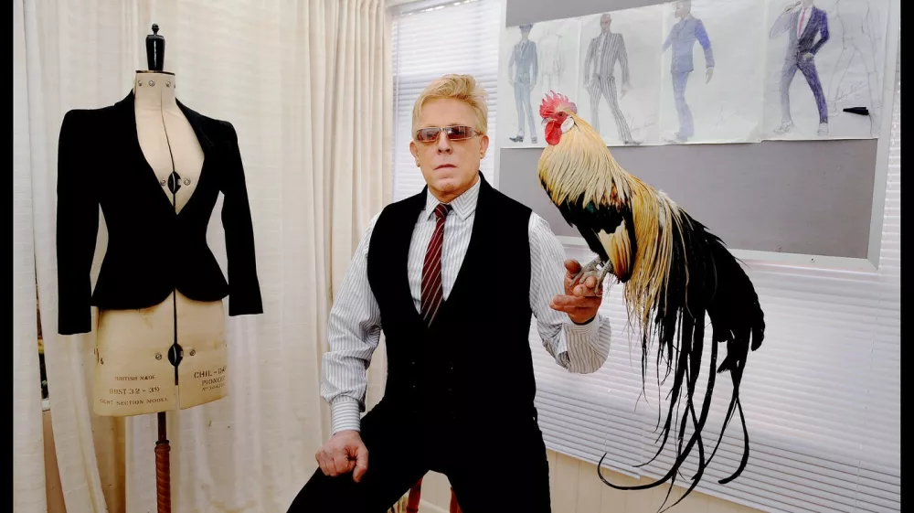 Antony Price is a London fashion designer who is best known for glamorous evening wear and suits, and for the seventies icon of the cap sleeve t-shirt (trading under the Plaza label for the premium price of Ł6, this was quickly 'ripped off' by numerous other manufacturers). Price has collaborated with a number of musical performers, including David Bowie, Steve Strange, and Duran Duran. but is best known for his close working relationship with Bryan Ferry and Roxy Music, whose respective 'looks' were defined by Price's designs. Sarah Lee,Image: 1060085752, License: Rights-managed, Restrictions: WORLDWIDE RIGHTS AVAILABLE. End users shall not licence, sell, transmit, or distribute any photographs represented by eyevine, to any third party., Model Release: no