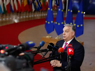 Hungary's Prime Minister Viktor Orban speaks with the media as he arrives for the EU Summit in Brussels, Thursday, Dec. 18, 2025. (AP Photo/Geert Vanden Wijngaert)