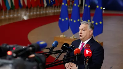 Hungary's Prime Minister Viktor Orban speaks with the media as he arrives for the EU Summit in Brussels, Thursday, Dec. 18, 2025. (AP Photo/Geert Vanden Wijngaert)