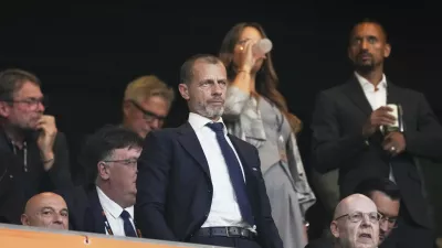 UEFA President Aleksander Ceferin, center, attends during the Europa League final soccer match between Tottenham Hotspur and Manchester United at the San Mames Stadium in Bilbao, Spain, Wednesday, May 21, 2025. (AP Photo/Jose Breton)