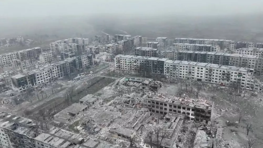 A drone view shows damaged buildings, amid Russia's attack on Ukraine, in Myrnohrad, Donetsk Region, Ukraine, in this still image obtained from a video released on December 15, 2025. Obtained by Reuters/via REUTERS THIS IMAGE HAS BEEN SUPPLIED BY A THIRD PARTY. VERIFICATION: Reuters was able to verify the location as Myrnohrad from the buildings and road layout seen in the video which matched satellite imagery of the area. The date when the video was filmed could not be independently verified.