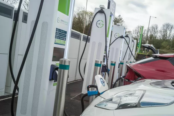 2XBHF6A Electric Vehicles charging at Annandale motorway service station on the A74 (M) near Lockerbie Scotland