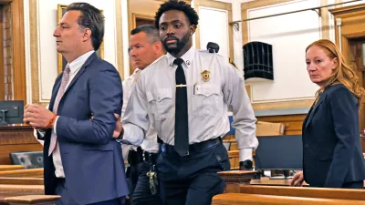 Brian Walshe, left, is escorted out of court after being found guilty of the first degree murder of his wife Ana in 2023 by a Norfolk Superior Court jury in Dedham, Mass., on Monday, Dec. 15, 2025. (Greg Derr/The Patriot Ledger via AP, Pool)