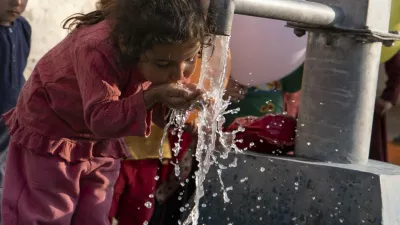 KABUL, AFGHANISTAN - OCTOBER 31: A child drinks water from the water-well in Kabul, Afghanistan on October 31, 2022 as it is voluntarily established by an NGO, the Cansuyu Charity and Solidarity Organization. 14 water-wells have been set up in 14 regions where have water problem due to drought. Muhammed Abdullah Kurtar / Anadolu Agency,Image: 737402624, License: Rights-managed, Restrictions:, Model Release: no