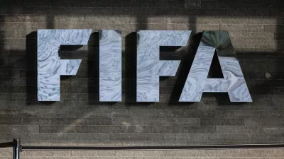 FILED - 13 December 2024, Switzerland, Zurich: The FIFA logo is seen on the facade of FIFA headquarters before the draw ceremony for the 2026 FIFA World Cup qualifiers. Photo: Christian Charisius/dpa
