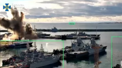 Footage released by the Security Service of Ukraine shows what it says is a strike on a Russian submarine at a port facility, in Novorossiysk, Krasnodar Region, Russia, in this screengrab from video released on December 15, 2025.  Security Service Of Ukraine/Handout via REUTERS  THIS IMAGE HAS BEEN SUPPLIED BY A THIRD PARTY. GRAPHIC OVERLAYS FROM SOURCE. BEST QUALITY AVAILABLE. Verification: - Port layout and piers matched satellite imagery. - Date could not be verified independently.