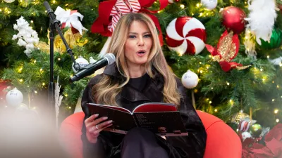 First lady Melania Trump reads "How Does Santa Go Down the Chimney?" to children and their families at Children's National Hospital, Friday, Dec. 5, 2025, in Washington. (AP Photo/Allison Robbert)