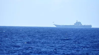 FILE PHOTO: A helicopter takes off from China's Shandong aircraft carrier, over Pacific Ocean waters, south of Okinawa prefecture, Japan, in this handout photo taken April 15, 2023 and released by the Joint Staff Office of the Defense Ministry of Japan April 17, 2023. Joint Staff Office of the Defense Ministry of Japan/HANDOUT via REUTERS ATTENTION EDITORS - THIS IMAGE WAS PROVIDED BY A THIRD PARTY. MANDATORY CREDIT./File Photo