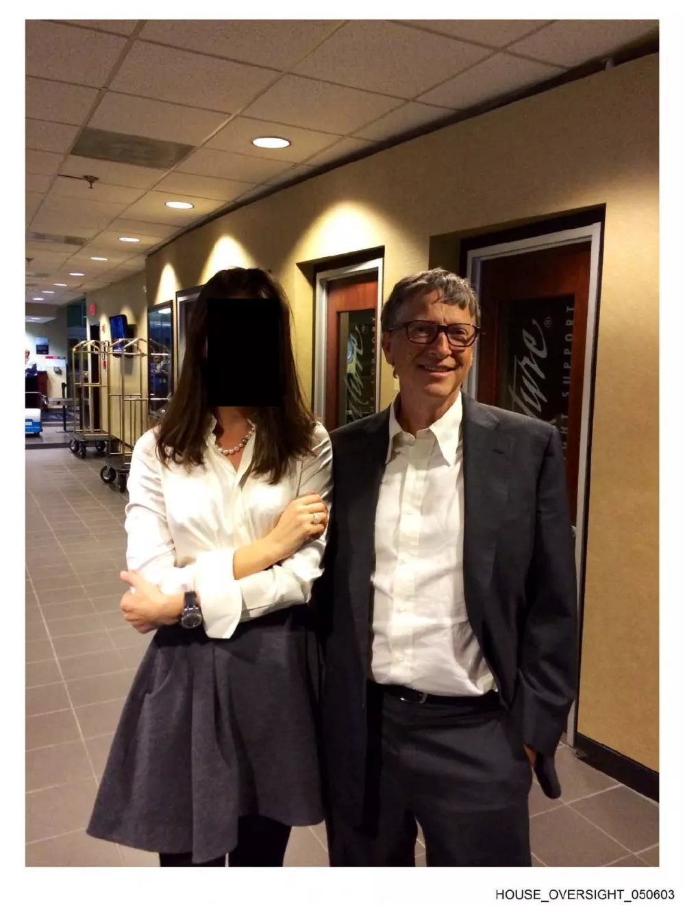 Bill Gates appears with a woman, who's identity has been obscured, in this image from the Epstein estate released by House Oversight Committee Democrats in Washington, D.C., U.S., on December 18, 2025. House Oversight Committee Democrats/Handout via REUTERS THIS IMAGE HAS BEEN SUPPLIED BY A THIRD PARTY. REDACTED AREA FROM SOURCE.