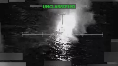 A vessel that the U.S. military said was suspected of smuggling drugs, burns after being struck with a kinetic weapon in a location given as the Eastern Pacific, in this screengrab taken from a handout video released December 18, 2025. U.S. Southern Command/Handout via REUTERS. THIS IMAGE HAS BEEN SUPPLIED BY A THIRD PARTY. TEXT OVERLAY AND BLURRING FROM SOURCE. VERIFICATION LINES: Reuters was not able to independently verify the location or the date when the video was filmed. Upon checking this footage, no old results were found.