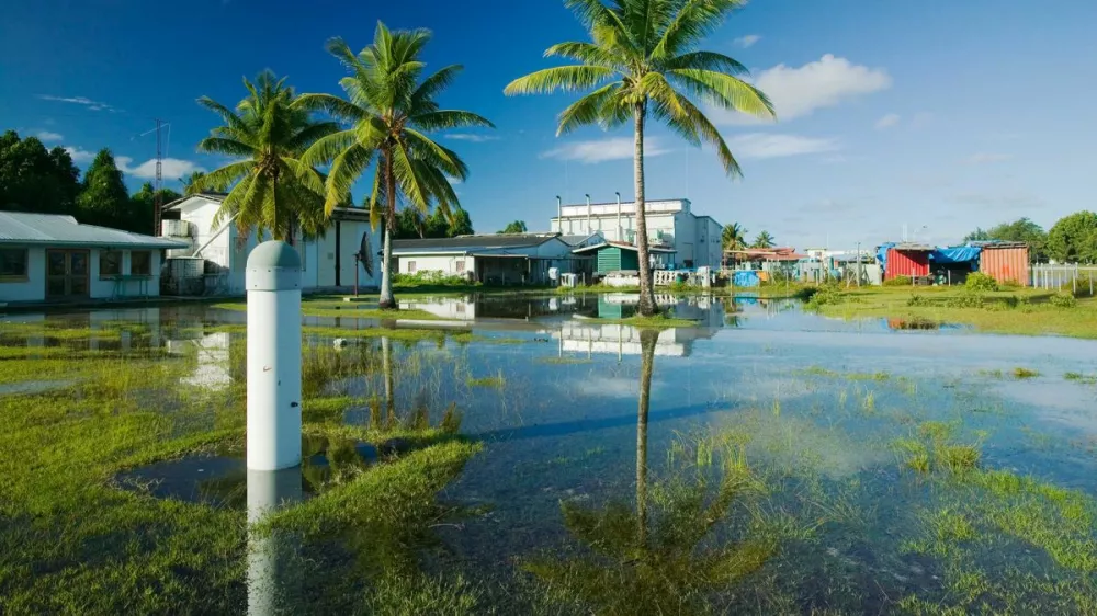 This image was taken in 2007, showing a town submerged in water on the Funafuti Atoll. Its population of more than 6,000 people has been battling with the direct consequences of rising sea levels. Residents of the capital Tuvalu have seen very frequent flooding in populated areas due to the fact that it is at most 4.57 meters (15 feet) above sea level. Dubbed one of "the most vulnerable Pacific Ocean islands," its residents have to make the ultimate choice: leave the islands or deal with the consequences.