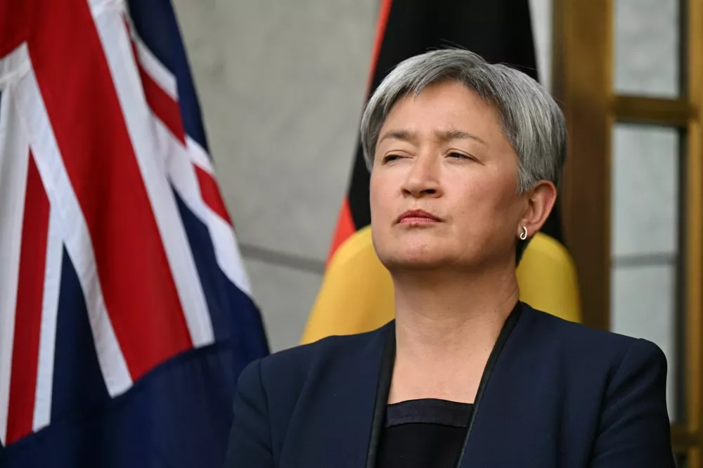 Australian Foreign Affairs Minister Penny Wong looks on, during a press conference at Parliament House in Canberra, Australia, August 26, 2025. AAP/Lukas Coch via REUTERS  ATTENTION EDITORS - THIS IMAGE WAS PROVIDED BY A THIRD PARTY. NO RESALES. NO ARCHIVE. AUSTRALIA OUT. NEW ZEALAND OUT. NO COMMERCIAL OR EDITORIAL SALES IN NEW ZEALAND. NO COMMERCIAL OR EDITORIAL SALES IN AUSTRALIA.