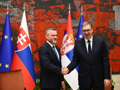 21 December 2025, Serbia, Belgrade: Slovak President Peter Pellegrini (L) meets with Serbian President Aleksandar Vucic at the Palace of Serbia in Belgrade. Photo: Martin Medňansk&yacute;/TASR/dpa