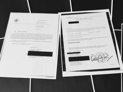 Pages that show New York grand jury subpoenas being issued into the Jeffrey Epstein and Ghislaine Maxwell investigation, then pages of redactions that follow, in this document released by the U.S. Justice Department, are photographed, Friday, Dec. 19, 2025, in Washington. (AP Photo/Jon Elswick)