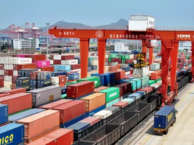 FILE PHOTO: Cargos are uploaded onto a China-Europe freight train at the China-Kazakhstan (Lianyungang) Logistics Cooperation Base in Lianyungang, Jiangsu province, China April 10, 2025. China Daily via REUTERS ATTENTION EDITORS - THIS IMAGE WAS PROVIDED BY A THIRD PARTY. CHINA OUT. NO COMMERCIAL OR EDITORIAL SALES IN CHINA./File Photo
