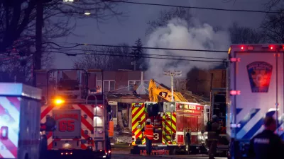 First responders work the scene of an explosion and fire at Bristol Health & Rehab Center, Tuesday, Dec. 23, 2025, in Bristol, Pa. (Monica Herndon/The Philadelphia Inquirer via AP)