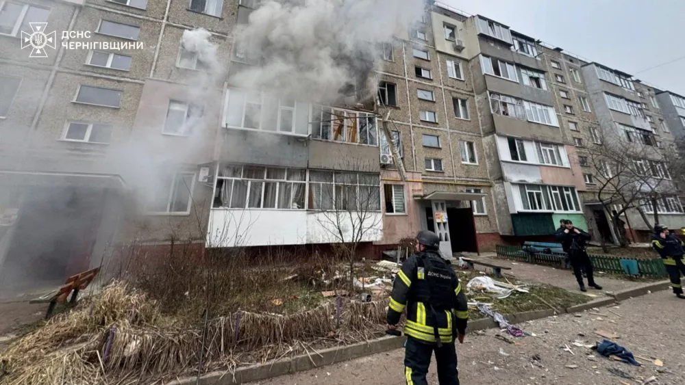 Emergency employees work at the site of an apartment building hit by a Russian drone strike, amid Russia's attack on Ukraine, in Chernihiv, Ukraine December 25, 2025. Press service of the State Emergency Service of Ukraine in Chernihiv region/Handout via REUTERS ATTENTION EDITORS - THIS IMAGE HAS BEEN SUPPLIED BY A THIRD PARTY. DO NOT OBSCURE LOGO.