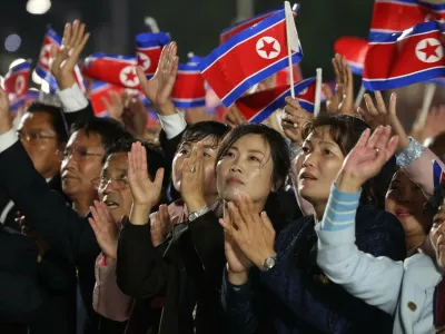 9023815 10.10.2025 People watch a military parade marking the 80th anniversary of the founding of North Korean Workers' Party at Kim Il Sung Square in Pyongyang, North Korea.,Image: 1044653182, License: Rights-managed, Restrictions: Editors' note: THIS IMAGE IS PROVIDED BY RUSSIAN STATE-OWNED AGENCY SPUTNIK., Model Release: no