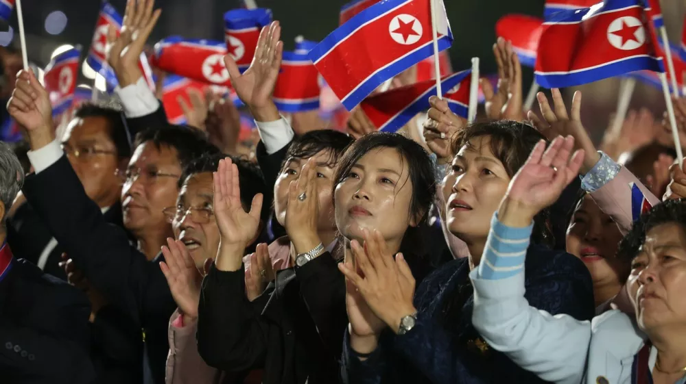 9023815 10.10.2025 People watch a military parade marking the 80th anniversary of the founding of North Korean Workers' Party at Kim Il Sung Square in Pyongyang, North Korea.,Image: 1044653182, License: Rights-managed, Restrictions: Editors' note: THIS IMAGE IS PROVIDED BY RUSSIAN STATE-OWNED AGENCY SPUTNIK., Model Release: no