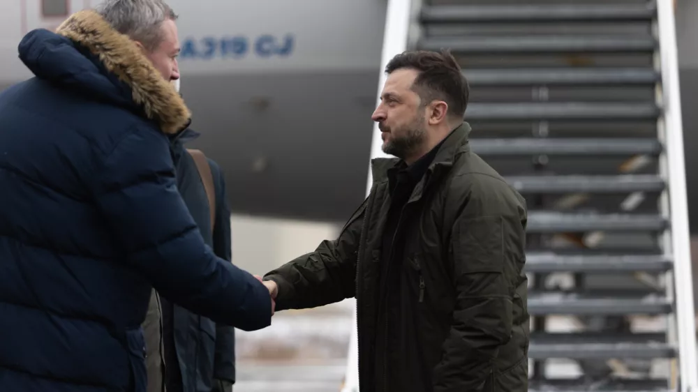 Ukrainian President Volodymyr Zelenskyy, right, is greeted as he arrives in Halifax, N.S. on Saturday, Dec. 27, 2025.(Riley Smith /The Canadian Press via AP)