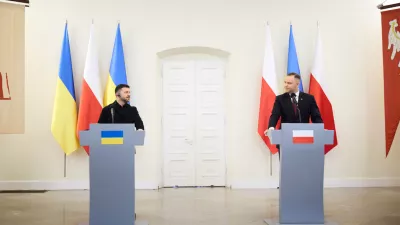 HANDOUT - 19 December 2025, Poland, Warsaw: Ukrainian President Volodymyr Zelensky and Polish President Karol Nawrocki (R)&nbsp;hold a joint press conference at the Presidential Palace in Warsaw. Photo: -/Ukrainian Presidency/dpa - ATTENTION: editorial use only and only if the credit mentioned above is referenced in full