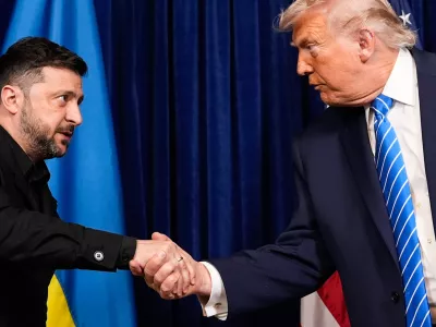 President Donald Trump and Ukraine's President Volodymyr Zelenskyy shake hands at the start of a joint news conference following a meeting at Trump's Mar-a-Lago club, Sunday, Dec. 28, 2025, in Palm Beach, Fla. (AP Photo/Alex Brandon)