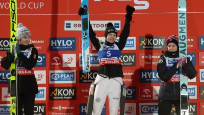 01 January 2025, Bavaria, Oberstdorf: Slovenia's Ski jumper winner Nika Prevc (C) celebrates alongside Norway's second placed Anna Odine Stroem (L) and third placed Eirin Maria Kvandal after the women's large hill 2nd round of the ski jumping Two Nights Tour. Photo: Karl-Josef Hildenbrand/dpa